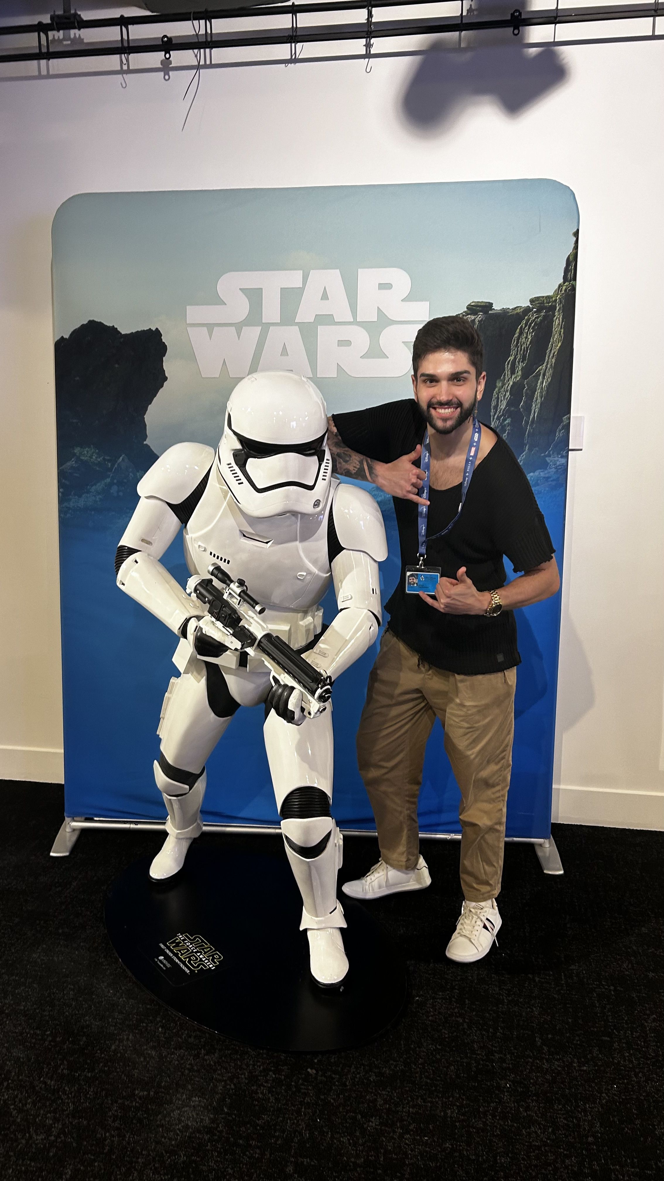 Michael stood next to a stormtrooper figurine from Star Wars